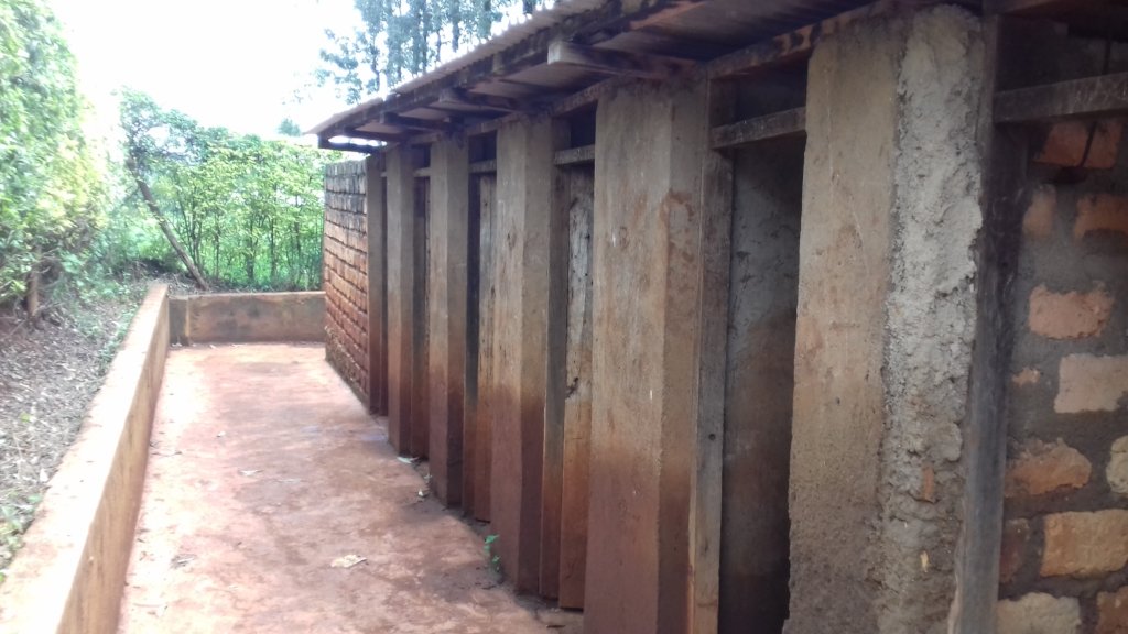 Improve boys' toilets to meet WHO standards