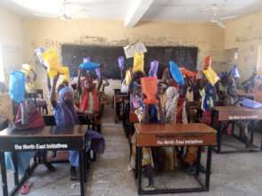 ChildVoice students receiving hygiene kits