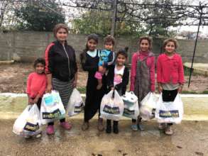 A family with aid delivery
