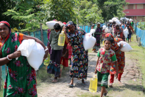 Villagers with distributed relief