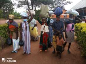 Families receiving COVID-19 relief supplies