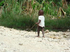 Baby following brother to find water