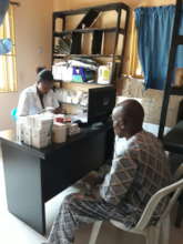 Patient receiving his drugs