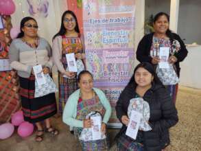 GuateBuena team with menstrual hygiene kits