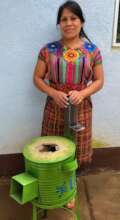 A GuateBuena beneficiary uses her efficient stove.