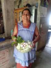 Showing off her home-grown salad