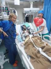 Medical team with a little patient