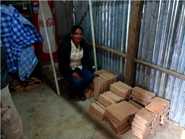 Stovebuilder distributing stove materials.