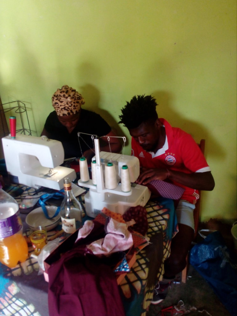 Sive learns to sew