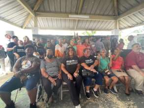 Residents celebrating the agreement signing.
