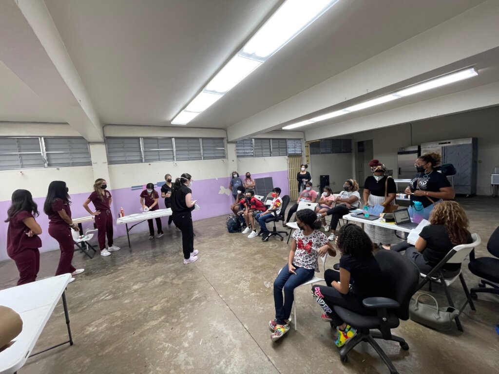 Medical school students offering workshops.