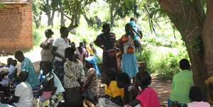 Local HIV-AIDs workshop held under tree
