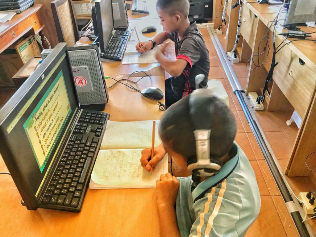 Figure 4: Kids taking notes