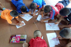Figure 3: Grade 1 students using coloring pencils