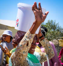 A happy beneficiary of a Bucket of Blessing