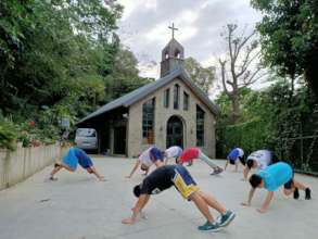 Children in Agape Children's Home exercising