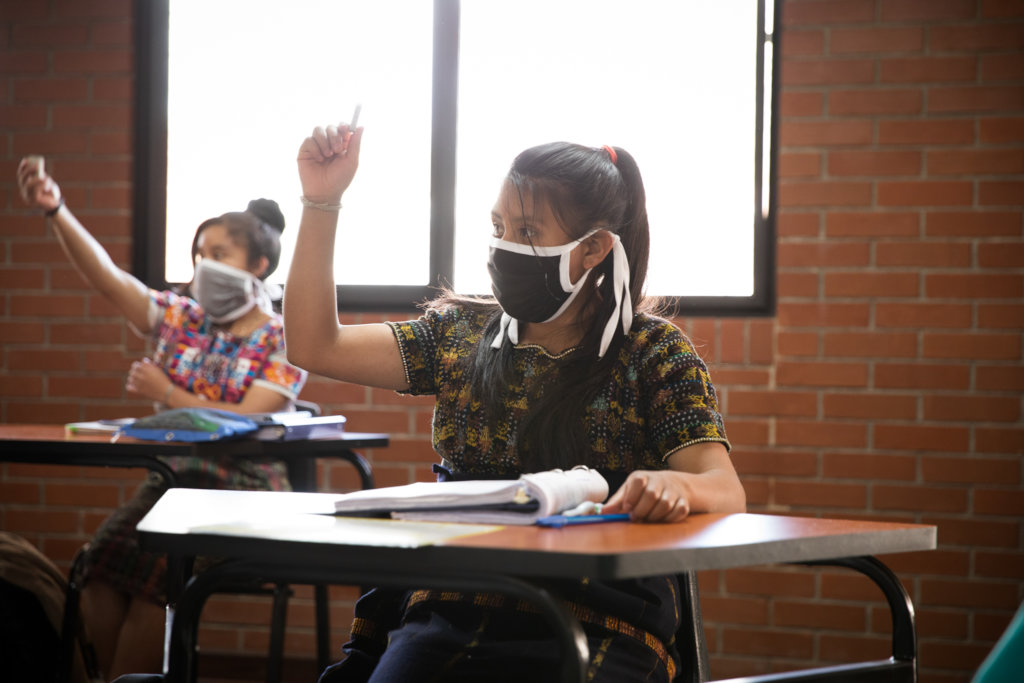 Girl Pioneers actively engaging in a class