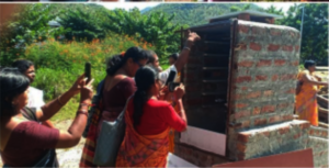 WEP students in Kadapa learning about solar dryers