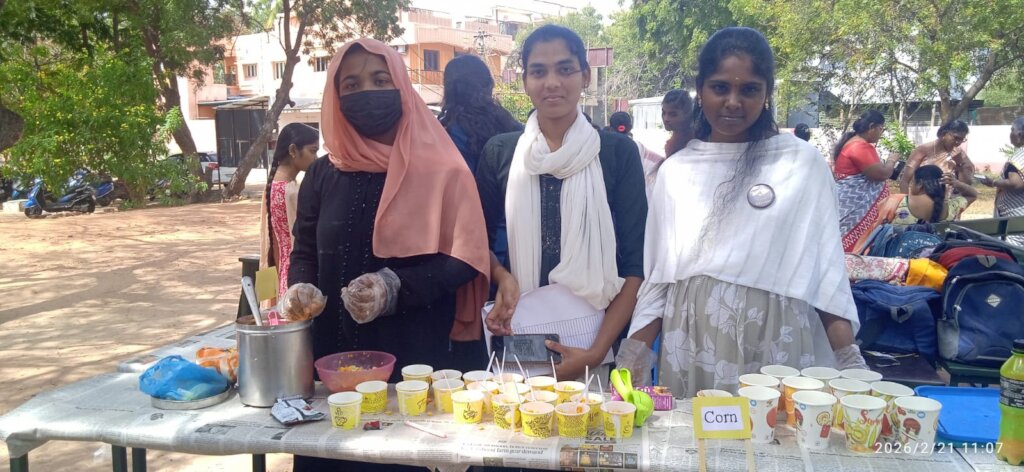 Student entrepreneurs running market stalls