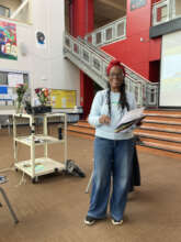 facilitator greets participants with a smile
