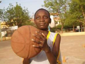 Awa playing basketball