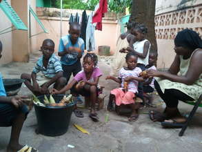 ACFA-Mali Children enjoying roasted corn