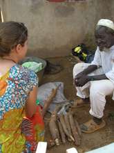 Sarah visiting with Kadiatou's father
