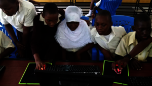 Orphans Africa  orphan students with computer