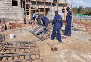 Welding trainees on the job