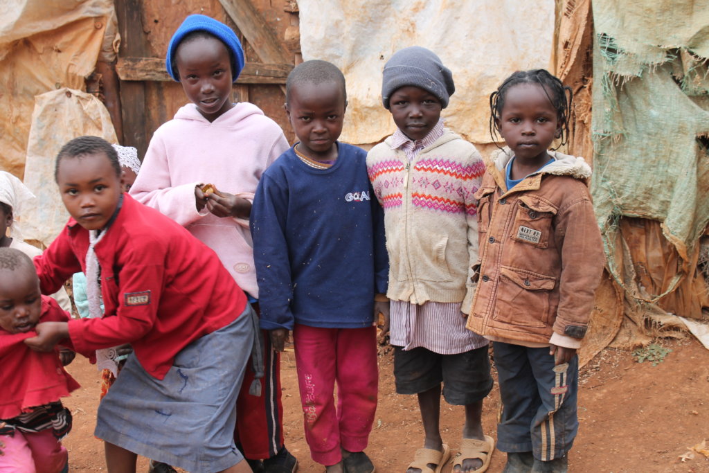 Children Outside their house