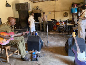 Musicians set up their equipment