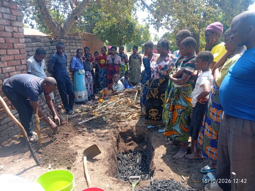 Farmers taking part in hands-on biochar training i
