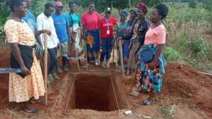 Measuring new trench dimensions to make biochar