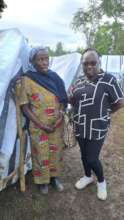 Mercy visits farmer at tent camp after flooding