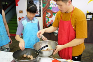 Chef Eric Wu with youth