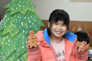 ChingChuan youth with their gingerbread cookie