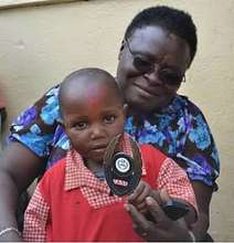 Lucy Kayiwa and Nursery School Student