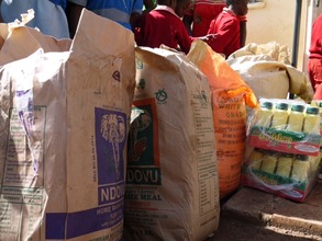 Baskets include flour, sugar, oil, rice & porridge