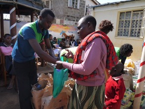 Families receive staple foods over summer break