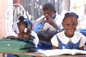 Haitian students receiving supplies