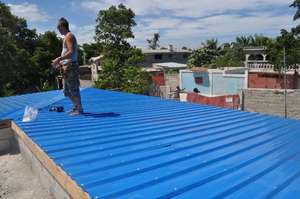 Roof nearing completion at Institution Classique
