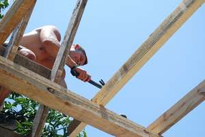 Building classroom roofs at Foyer d'Orelph