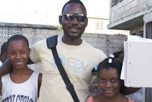 EDV staff and two children we've helped