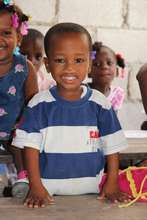 Attending school in a classroom you helped build!