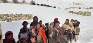 Students with Yaks in the background