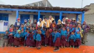 Teachers, students and school committee in Saldang