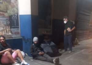 David chatting with some people on the street