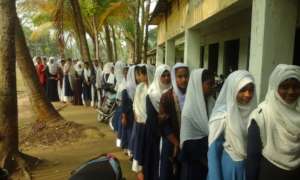 Waiting village students for vision test