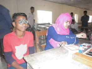 Doctor vision check of School children in Eye camp