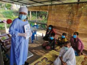 Dr Rida provides health education on the Stung Sen